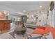 Spacious living room is open to the dining area and features modern lighting and decor at 3658 Brock Rd, Duluth, GA 30096