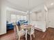 Inviting dining area with wood floors and seating for four at 1395 Crestwind Nw Rd, Kennesaw, GA 30152