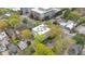 Aerial view of a building surrounded by lush green trees and a view of the neighborhood at 287 14Th Nw St # 8, Atlanta, GA 30318
