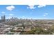 Panoramic city skyline view with surrounding trees, residential buildings, and a bright blue sky at 287 14Th Nw St # 8, Atlanta, GA 30318
