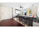 Living room featuring a projector screen, hardwood floors, and a custom table at 287 14Th Nw St # 8, Atlanta, GA 30318