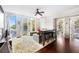 Bright living room boasts hardwood floors, neutral tones, and large windows at 287 14Th Nw St # 8, Atlanta, GA 30318