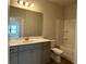 Bathroom featuring a modern vanity, large mirror, and a clean, white tub-shower at 3908 Shelleydale Dr, Powder Springs, GA 30127