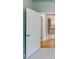 The entryway of this house shows a partial view of the open kitchen at 3908 Shelleydale Dr, Powder Springs, GA 30127