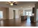 Open living space boasts hardwood floors, recessed lighting, and modern kitchen island at 3908 Shelleydale Dr, Powder Springs, GA 30127