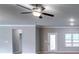Living room with hardwood floors, ceiling fan, and neutral tones offers a modern and inviting atmosphere at 3908 Shelleydale Dr, Powder Springs, GA 30127