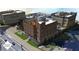 A stunning exterior rendering showing the building's facade, brickwork, sidewalks, and surrounding landscape at 120 N Main St # 2A, Alpharetta, GA 30009