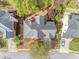 An aerial view showing the roof and location of the property in a suburban neighborhood at 1455 Oglethorpe Run Ln, Suwanee, GA 30024