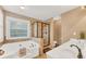 Bright bathroom featuring a bathtub, shower and double sink vanity with tile flooring at 1455 Oglethorpe Run Ln, Suwanee, GA 30024