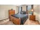 Cozy bedroom with neutral carpet and stylish furniture, creating a warm and inviting space at 1455 Oglethorpe Run Ln, Suwanee, GA 30024