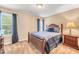 Bedroom features a carpeted floor, large window and is painted in neutral colors at 1455 Oglethorpe Run Ln, Suwanee, GA 30024
