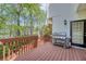 Outdoor deck with stainless steel grill, perfect for entertaining or relaxing outdoors at 1455 Oglethorpe Run Ln, Suwanee, GA 30024