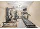 This exercise room features a variety of exercise machines and a mirrored wall at 1455 Oglethorpe Run Ln, Suwanee, GA 30024