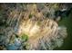 Overhead view of the waterfront property highlighting its expansive grounds and direct access to the water at 1280 Tynecastle Way, Sandy Springs, GA 30350