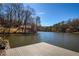 Private dock offers a unique waterfront experience with a tranquil lake setting at 1280 Tynecastle Way, Sandy Springs, GA 30350