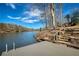 Stone steps lead to the private dock providing easy lake access and stunning views at 1280 Tynecastle Way, Sandy Springs, GA 30350