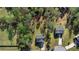 Aerial view of homes nestled among lush trees in a peaceful neighborhood at 15 Sloane Ct, Covington, GA 30016