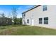 Backyard with grass and back of house at 15 Sloane Ct, Covington, GA 30016