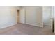 Bedroom featuring neutral carpet with a closet and an open doorway at 15 Sloane Ct, Covington, GA 30016