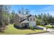 Beautiful two-story home with a two-car garage and manicured lawn at 15 Sloane Ct, Covington, GA 30016