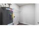 Utility room with water heater and shelving at 15 Sloane Ct, Covington, GA 30016