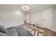 Spacious bedroom with modern light fixture and a toy carpet is great for  at 2376 Academy Ne Ct, Atlanta, GA 30345