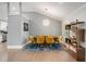 Dining area with a modern light fixture, stylish shelving, and seating for six, ideal for gatherings at 2376 Academy Ne Ct, Atlanta, GA 30345