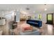 Open-concept living area with hardwood floors, and modern furnishings, creating a welcoming and stylish atmosphere at 2376 Academy Ne Ct, Atlanta, GA 30345