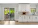 Sunroom features lots of light and access to the kitchen and to the outdoors at 2376 Academy Ne Ct, Atlanta, GA 30345