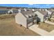Aerial view of a home with a well-maintained yard and community surroundings at 5372 Fountain Head Ln, Auburn, GA 30011