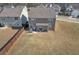 Aerial view of a backyard with a patio and furniture at 5372 Fountain Head Ln, Auburn, GA 30011