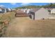 Aerial view of the large backyard with privacy fence and patio area of the property at 5372 Fountain Head Ln, Auburn, GA 30011