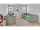 Bright bedroom with twin beds, a white dresser, and playful decorations at 5372 Fountain Head Ln, Auburn, GA 30011