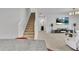Open floor plan showcasing the living room, stairway, and view of the bathroom at 5372 Fountain Head Ln, Auburn, GA 30011