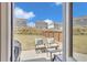 Outdoor patio with seating and a grill, perfect for entertaining at 5372 Fountain Head Ln, Auburn, GA 30011