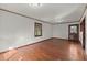 Spacious living room with hardwood floors, showcasing natural light and classic trim details throughout at 587 Coast Oak Cir, Lawrenceville, GA 30046