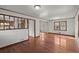Hardwood floors throughout living spaces offering an airy layout to the kitchen and dining areas at 587 Coast Oak Cir, Lawrenceville, GA 30046