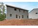 Exterior back view of a home with gray siding at 1097 Bodega Loop, Locust Grove, GA 30248