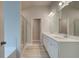Bright bathroom featuring a double vanity, walk-in shower and soaking tub at 1097 Bodega Loop, Locust Grove, GA 30248