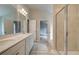 Bright bathroom featuring a double vanity and walk-in shower at 1097 Bodega Loop, Locust Grove, GA 30248