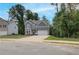 Two-story home featuring gray siding, white trim, an attached two-car garage, and a concrete driveway at 1097 Bodega Loop, Locust Grove, GA 30248