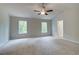 Large Primary bedroom with vaulted ceiling, ceiling fan, and large windows at 1097 Bodega Loop, Locust Grove, GA 30248