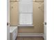 Well-organized walk-in closet with ample storage space and natural light at 126 Cottage Club Dr, Locust Grove, GA 30248