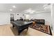 Finished basement features a billiards table and cozy seating area at 1870 Chattahoochee Run Dr, Suwanee, GA 30024