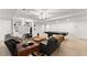 Basement living space with built-ins, billiards table, and plush seating at 1870 Chattahoochee Run Dr, Suwanee, GA 30024