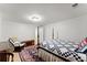Bedroom featuring a four poster bed and cozy sitting area at 1870 Chattahoochee Run Dr, Suwanee, GA 30024