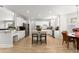 Open kitchen area with a large island, stainless steel appliances, and a breakfast nook at 1870 Chattahoochee Run Dr, Suwanee, GA 30024