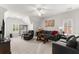 Upstairs living room featuring neutral colors, a comfortable seating area, and abundant natural light at 1870 Chattahoochee Run Dr, Suwanee, GA 30024