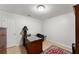 Clean, bright office space with wood floors, a simple desk, and a neutral color palette at 1870 Chattahoochee Run Dr, Suwanee, GA 30024
