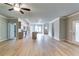 Open-concept kitchen and living space featuring stainless appliances and ample room at 3871 Shelleydale Dr, Powder Springs, GA 30127